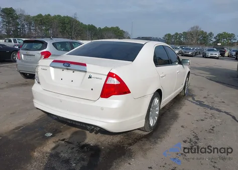 2010 Ford Fusion Hybrid из США, поврежденный, VIN 3FADP0L32AR233498